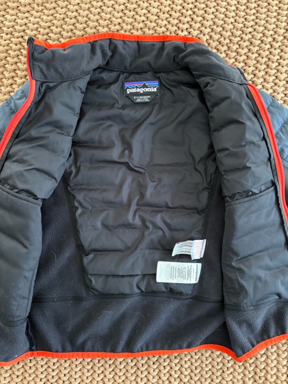 Patagonia Quilted Blue and Black Jacket with Orange Trim - Picture 4 of 5